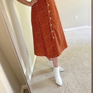 White leather ankle booties